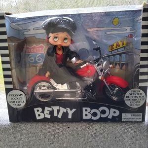 vintage 1999 talking betty boop doll on motorcycle about 12 in long and high